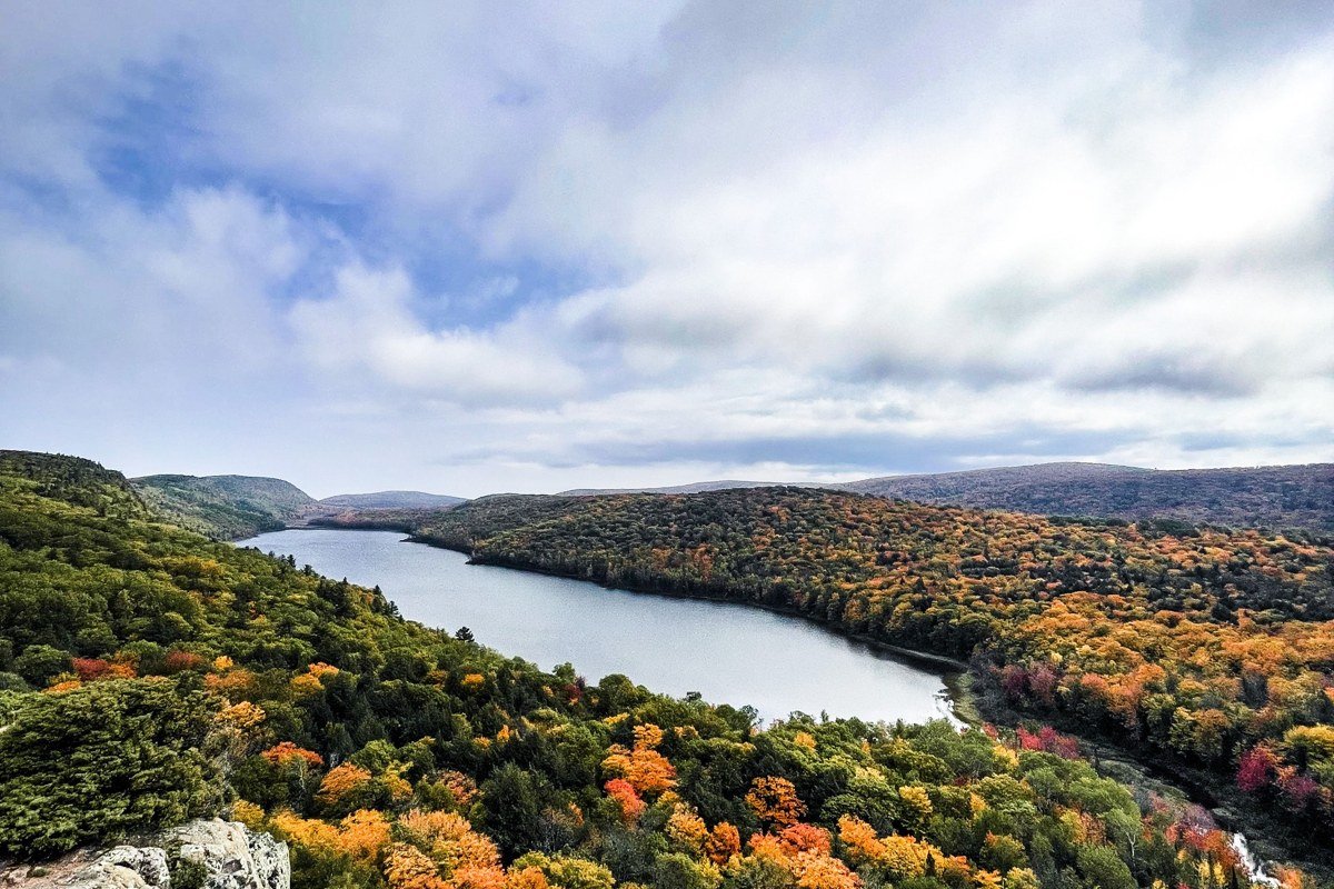 fog over the Presque Isle River mouth meeting Lake Superior in Porcupine Mountains Wilderness Michigan