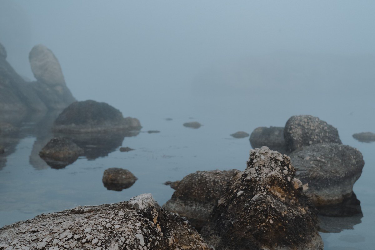 fog around abandoned 1800s furnace town ruins at Fayette Historic State Park Michigan on Lake Michigan