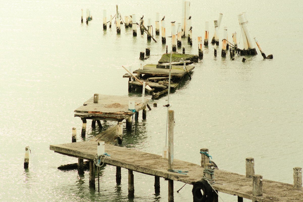 Grand Isle Louisiana fishing pier over Gulf marsh water