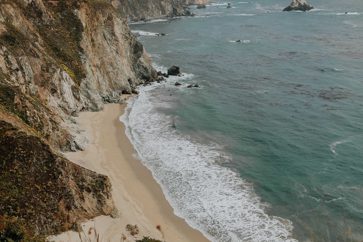 Sand Dollar Beach, Big Sur, California, longest sandy beach with cliffs and driftwood. Photo credit: placeholder, replace before publish