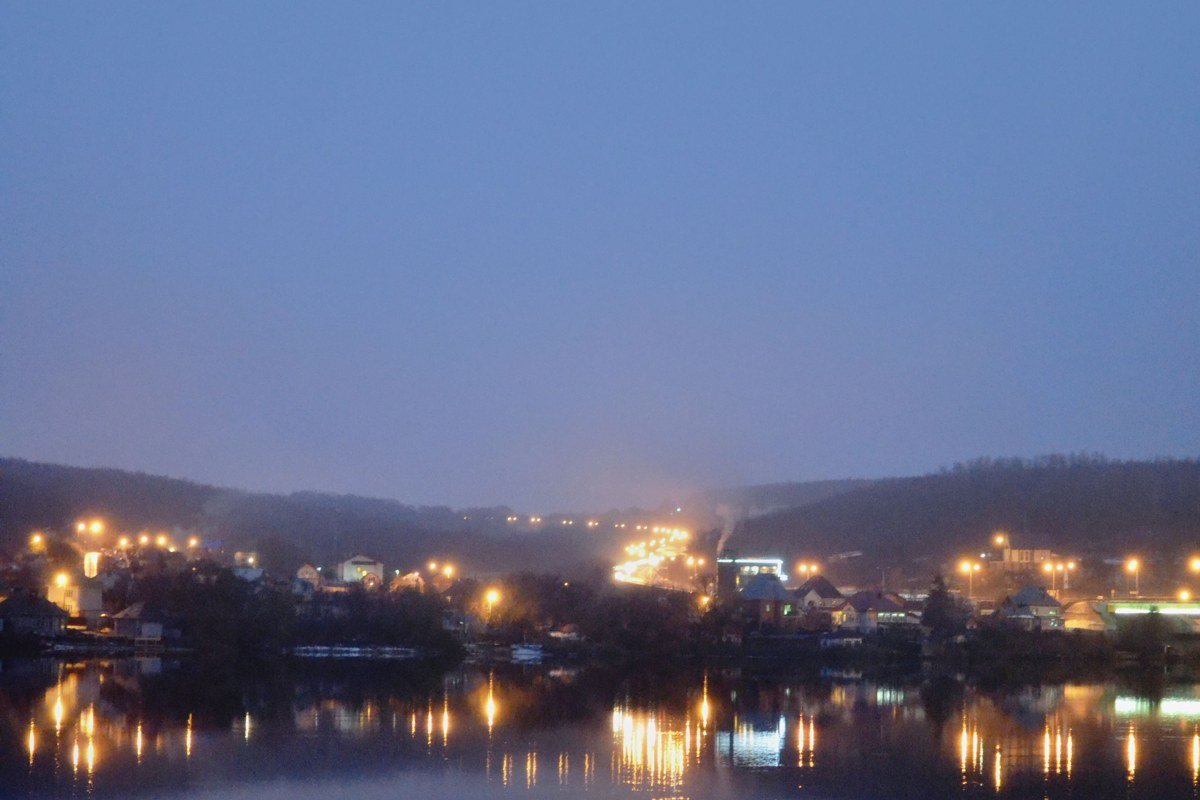 Gravois Mills cove at dusk in April, two-bedroom cabin dock, no boats in frame