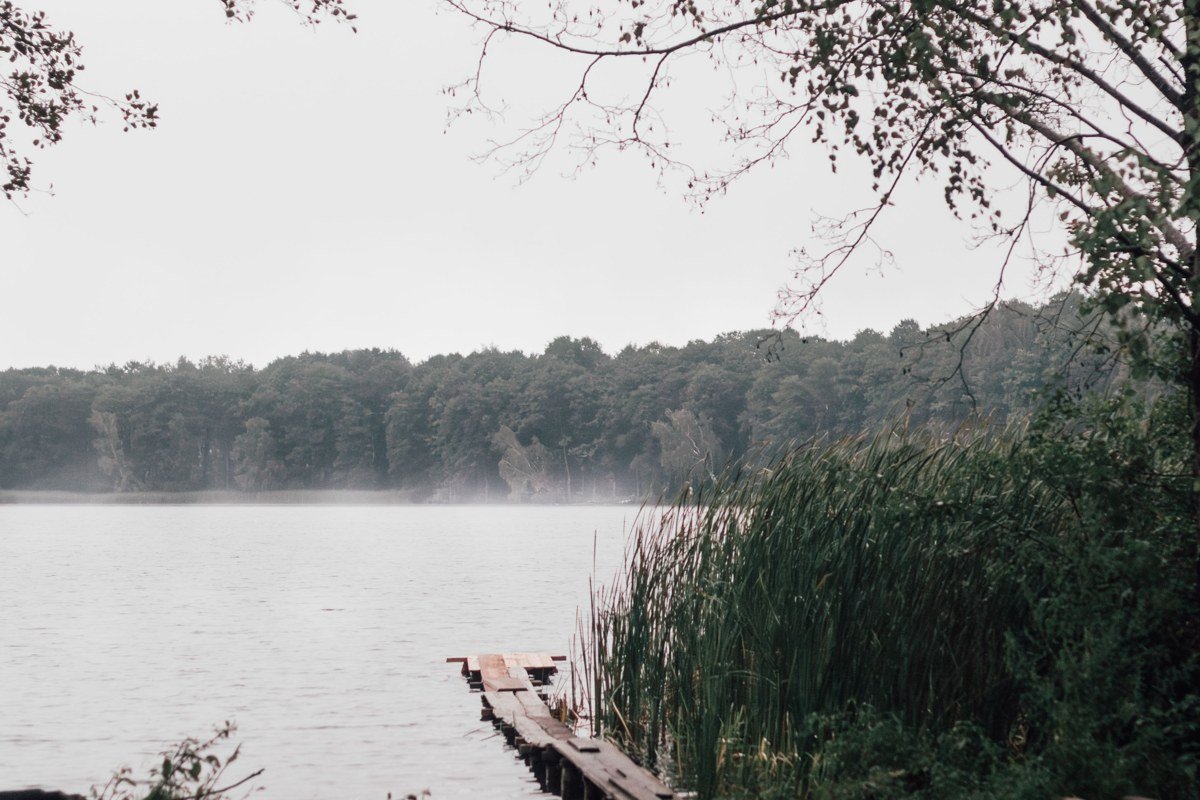 Wallenpaupack cove in late September, first turning leaves, lakefront cabin dock, calm water