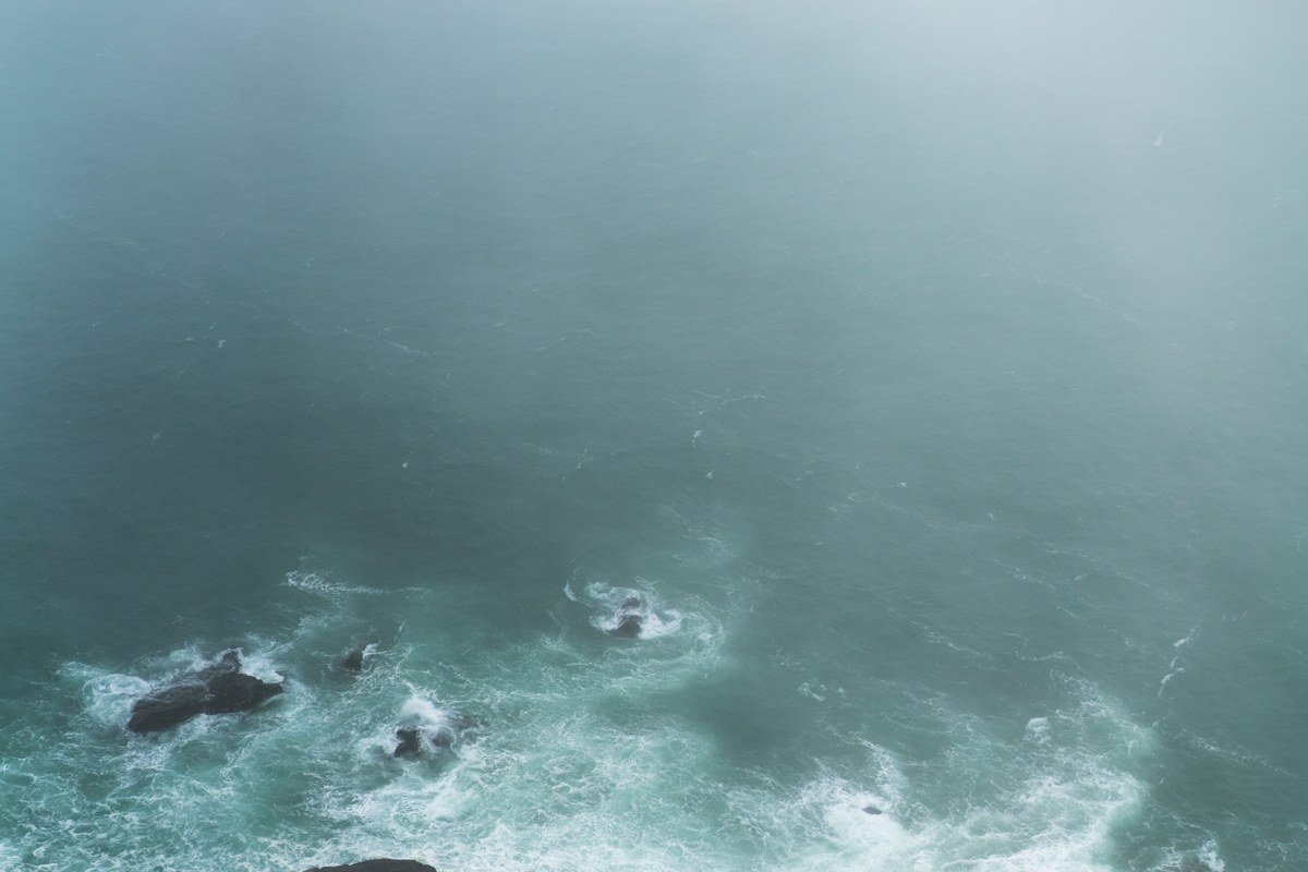 Cape Perpetua viewpoint Oregon coast fog over rocky shoreline and sea stacks
