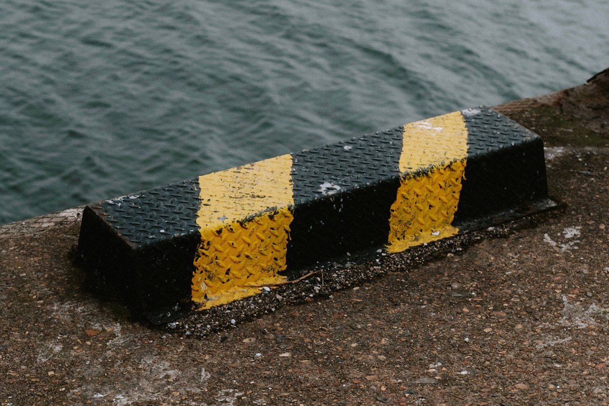 Rockland Maine breakwater lighthouse walk in fog with granite blocks