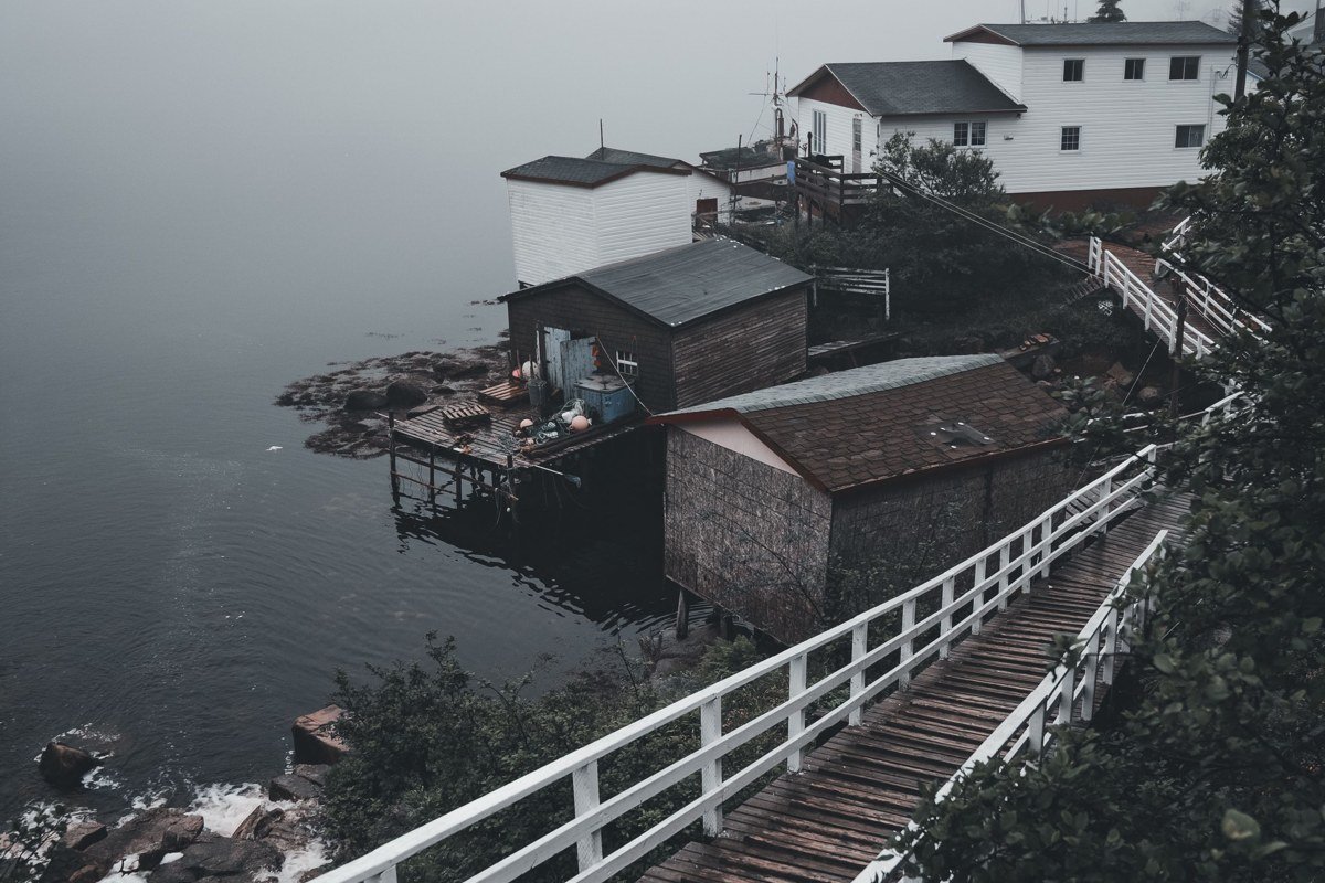 Port Clyde Maine general store and dock enveloped in fog