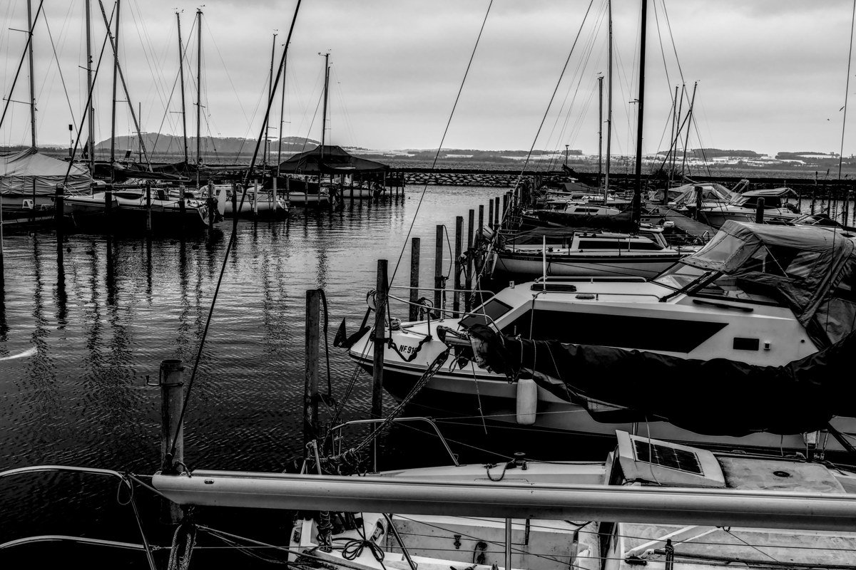 Saugatuck Michigan harbor with sailboats and dune landscape in fall