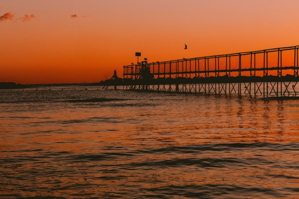 Grand Haven Michigan musical fountain and pier walkway at dusk