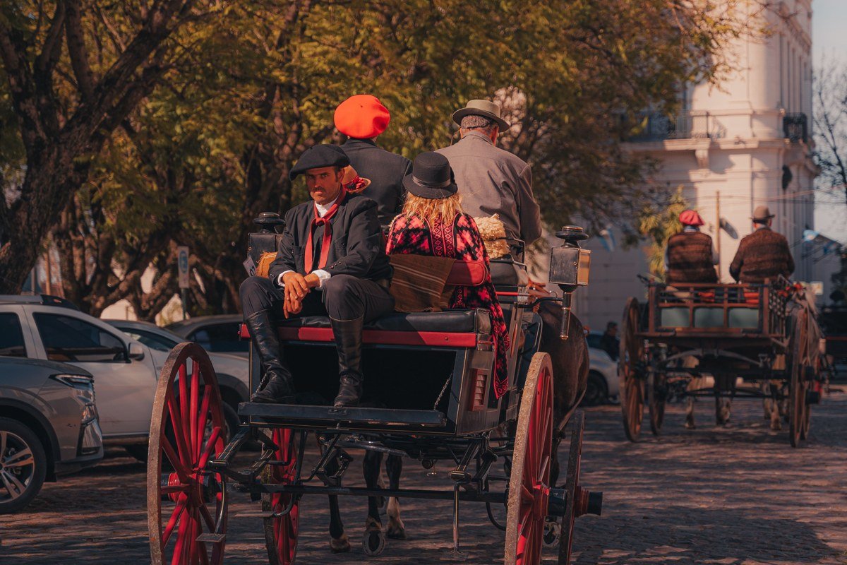 Mackinac Island Michigan horse-drawn carriage on Main Street with harbor view