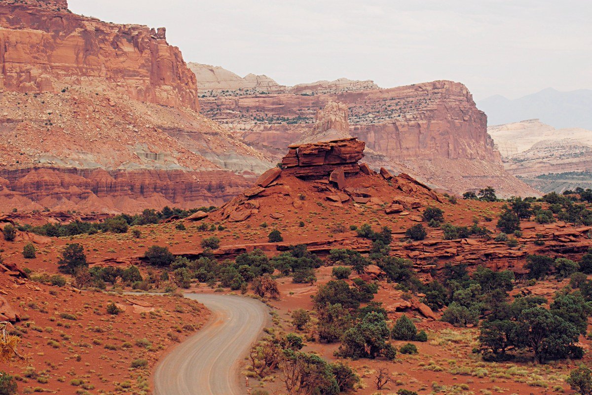 Panorama Point Capitol Reef sunset with orange cliffs and distant mountains