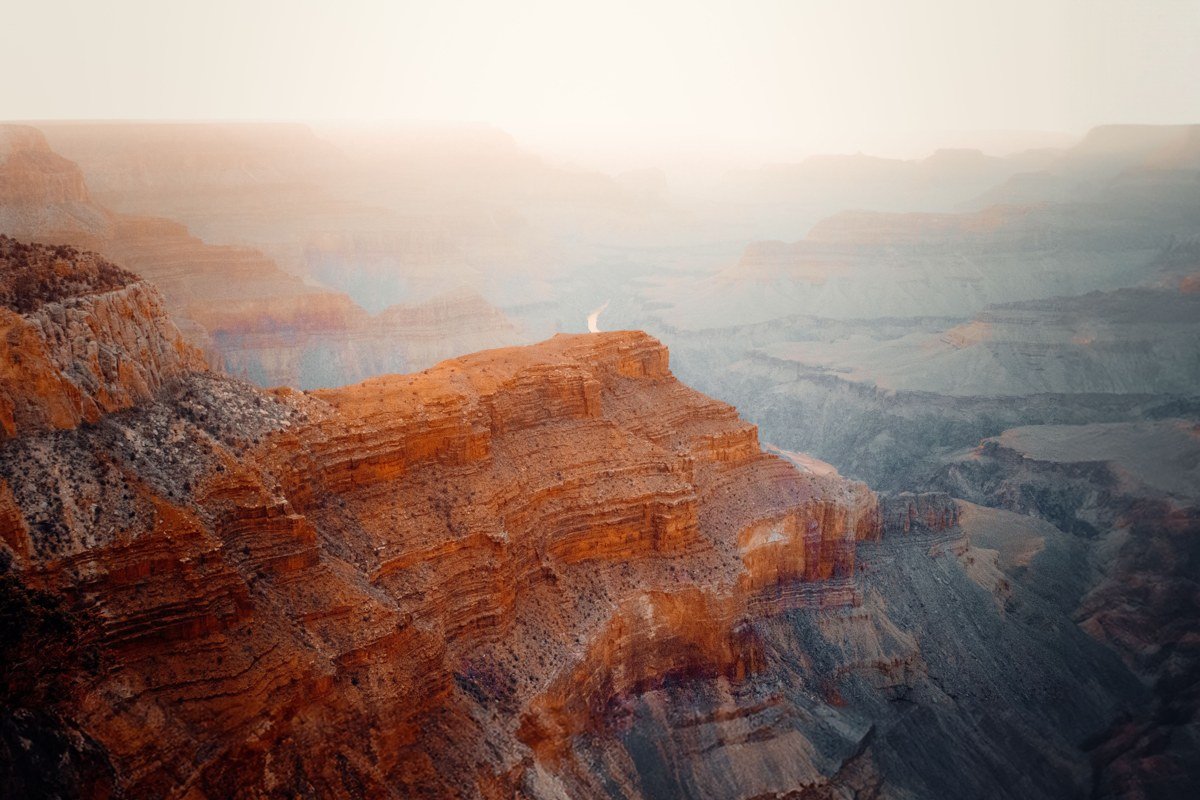 Mesa Arch Canyonlands sunrise light glowing under sandstone arch