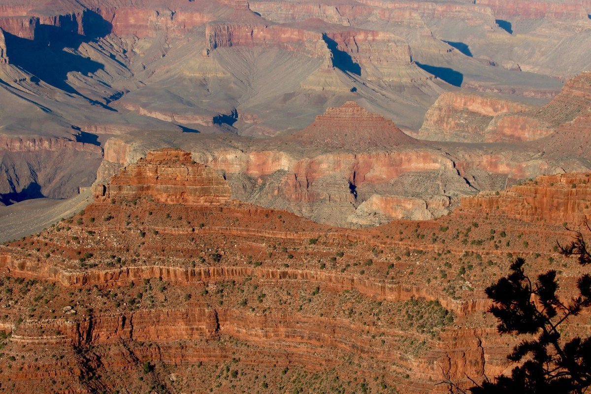 Grand View Point Canyonlands overlook canyon layers with La Sal Mountains snow-capped behind