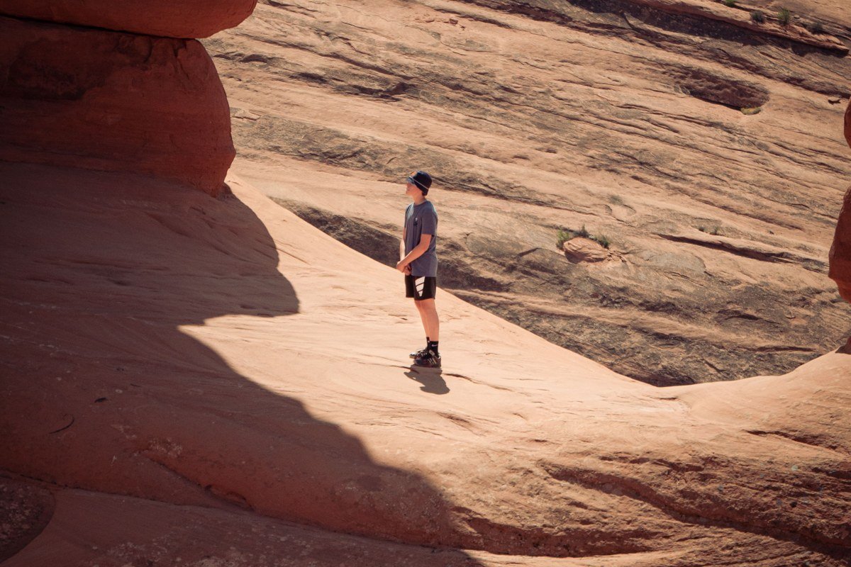 Park Avenue trail sandstone canyon walls at golden hour, Arches National Park
