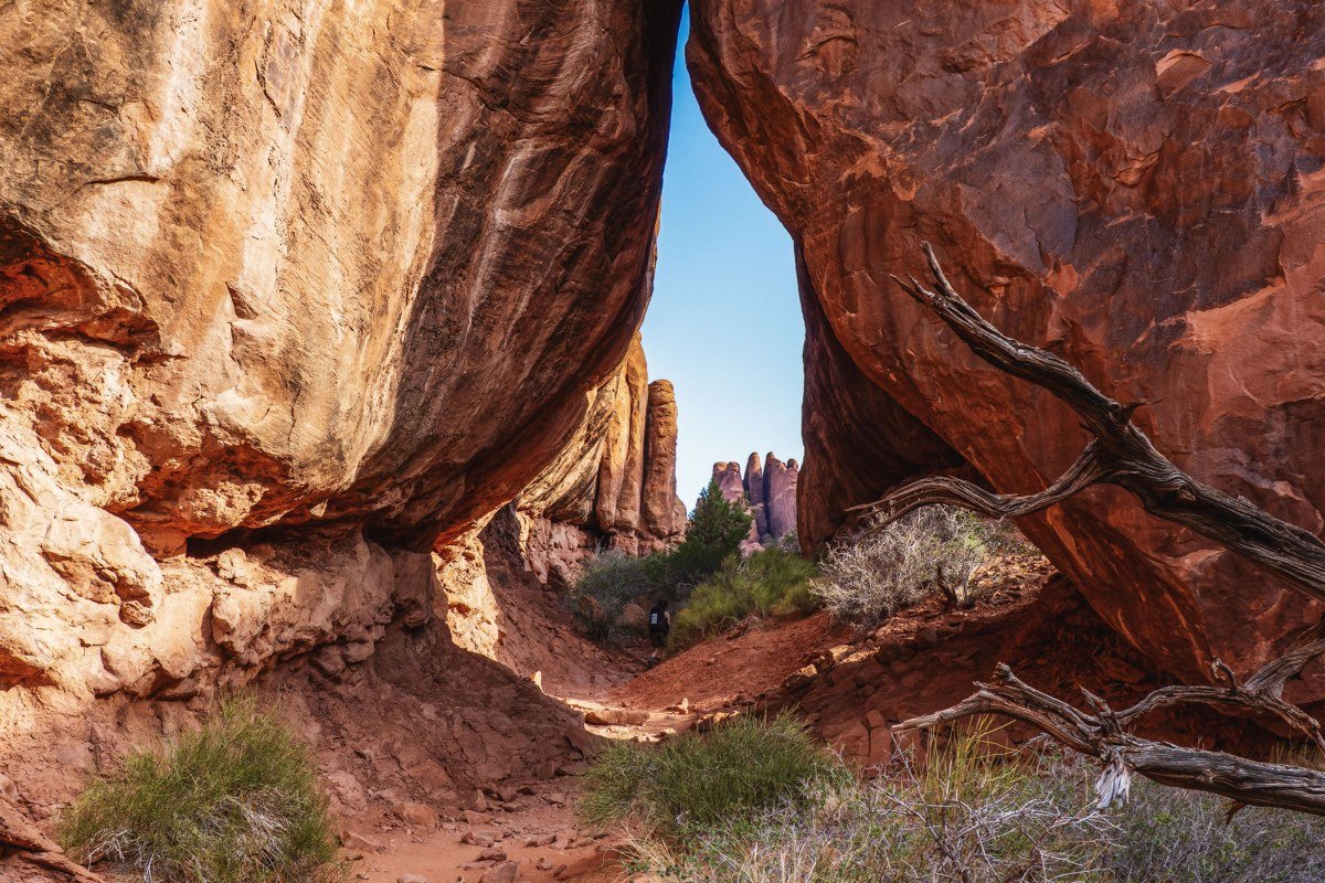Balanced Rock formation with dramatic clouds, short loop trail, Arches National Park