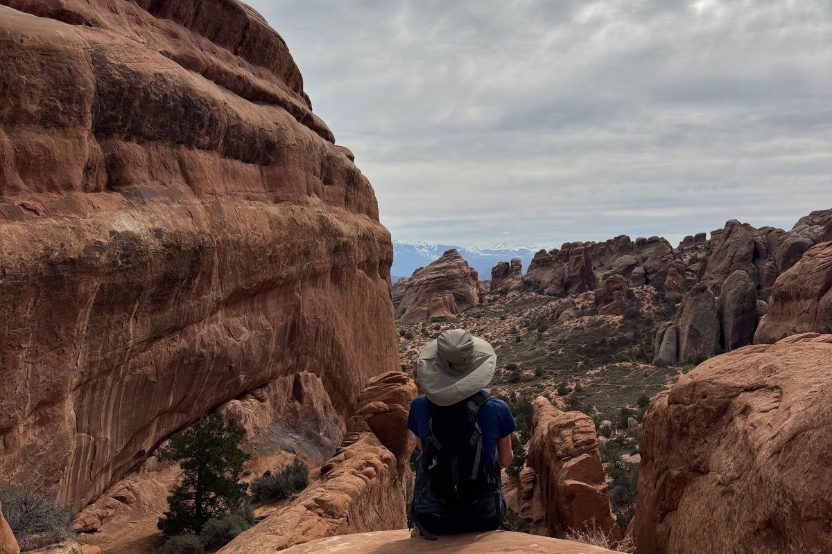 Landscape Arch thin ribbon of sandstone at golden hour, Devils Garden trail Utah