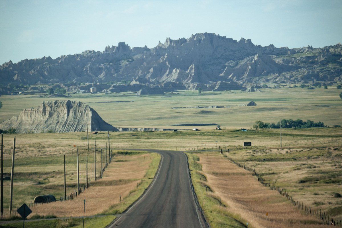 Big Badlands Overlook South Dakota sunrise light on striped rock formations from parking area