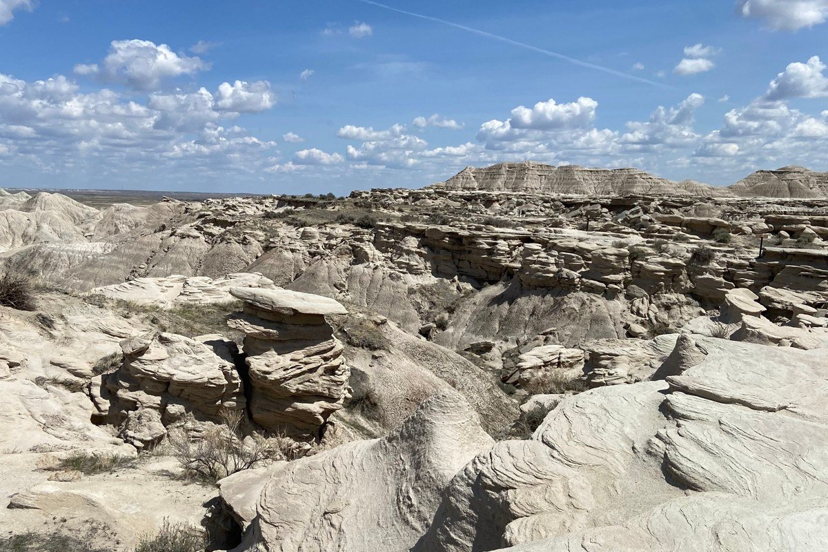 Yellow Mounds Overlook Badlands South Dakota golden and rust colored hills in morning sun