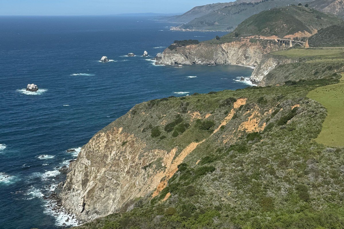 Rocky Point Big Sur ocean cliffs with fog rolling low over the water