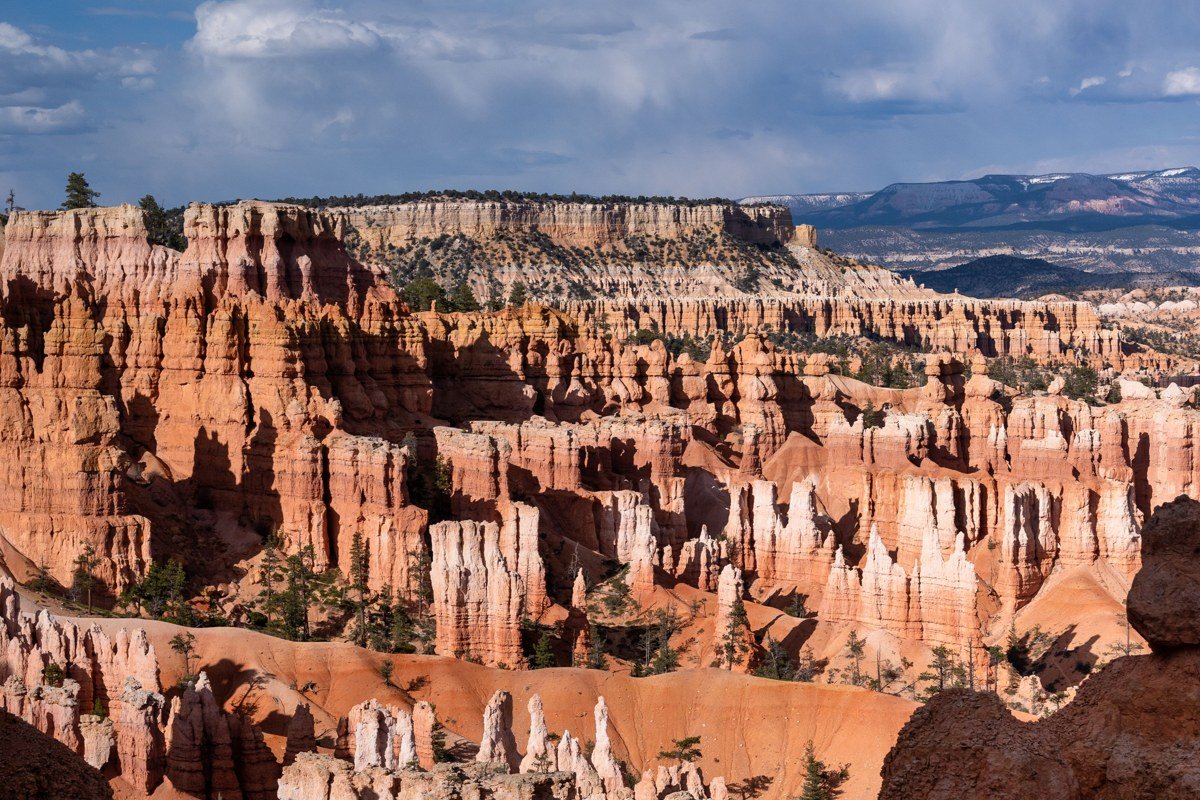 Bryce Canyon Sunset Point at sunrise with orange light on hoodoos