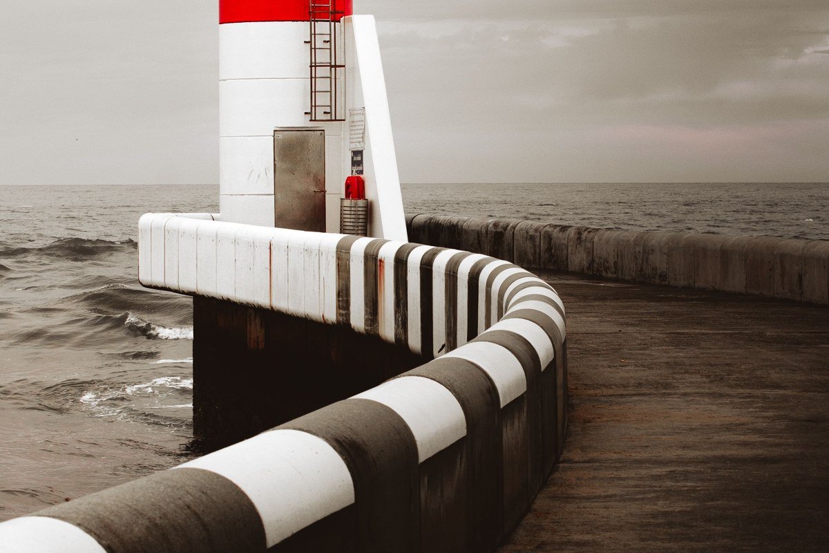 Chatham Massachusetts lighthouse overlooking the Atlantic and eroded barrier beach