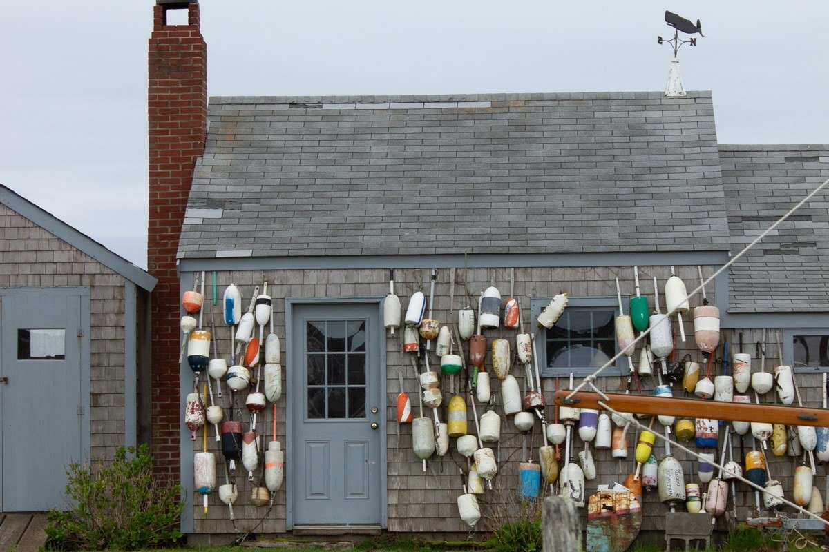 Wellfleet Massachusetts oyster shacks near the harbor with fishing boats