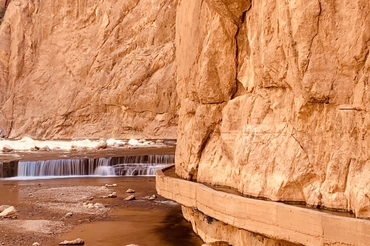 raft dropping into Zoom Flume rapid in Browns Canyon, granite walls rising above the river