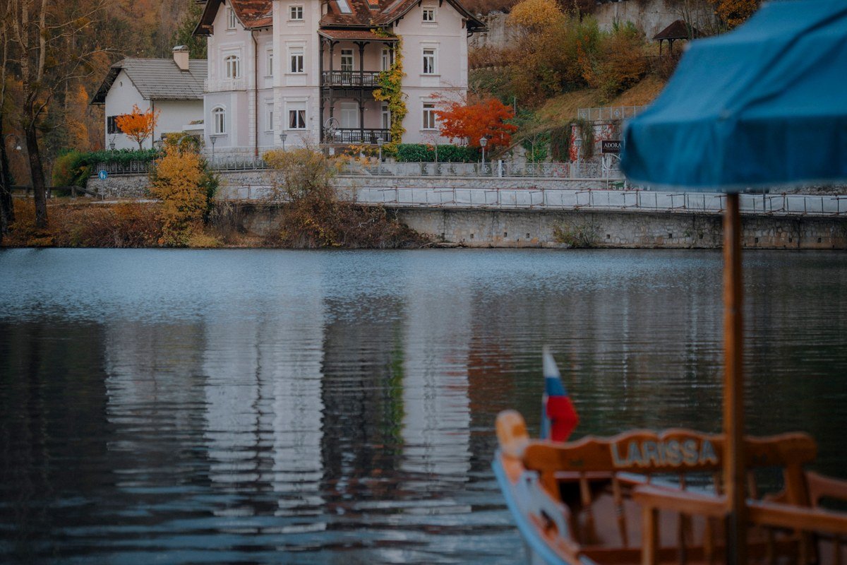 Lake George village waterfront with paddle steamer boat and mountains