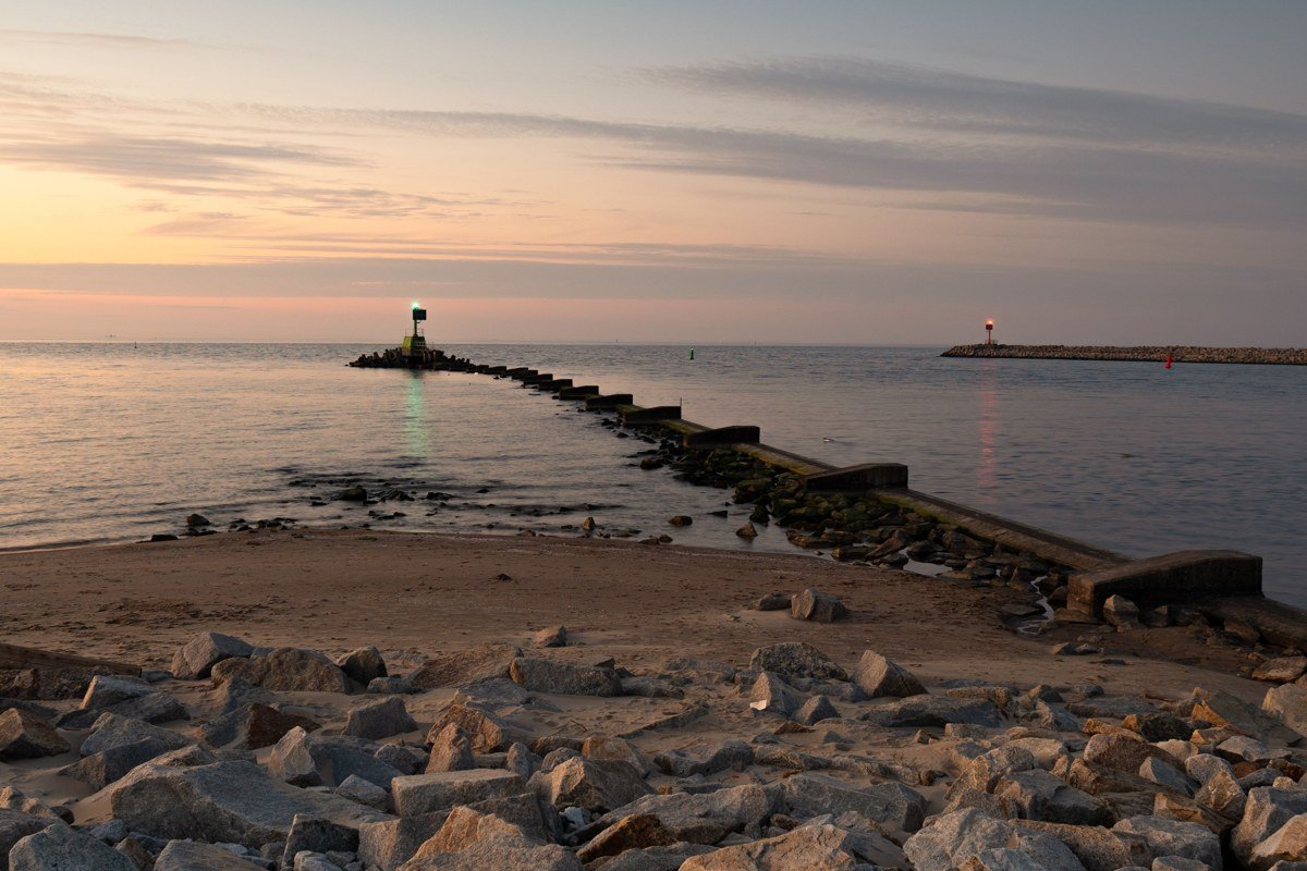 Rockland breakwater walkway leading out to the lighthouse, granite blocks underfoot