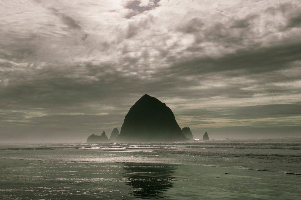 Bandon Oregon Face Rock sea stacks at sunset fog on the beach