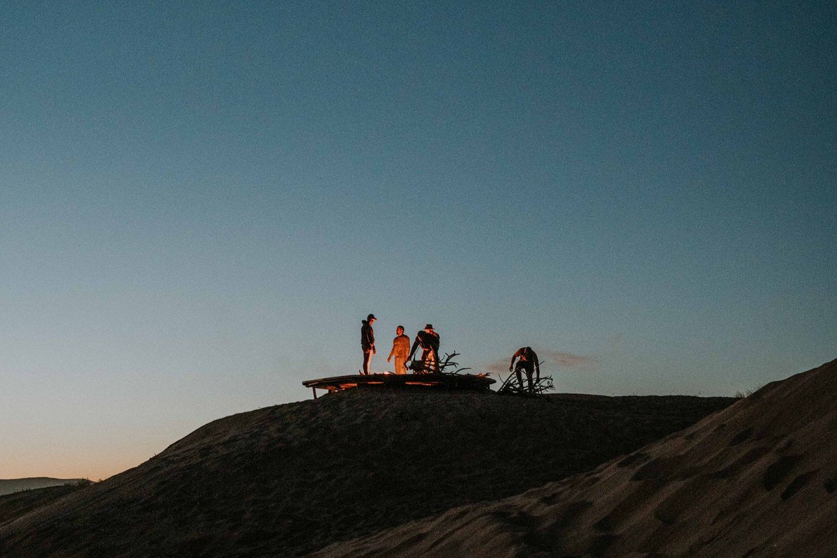 Jockey's Ridge sand dune Nags Head North Carolina at sunset with few people