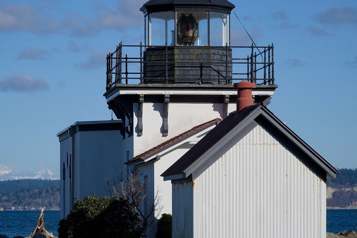 American Camp San Juan Island National Historical Park with prairie grass and Cattle Point lighthouse