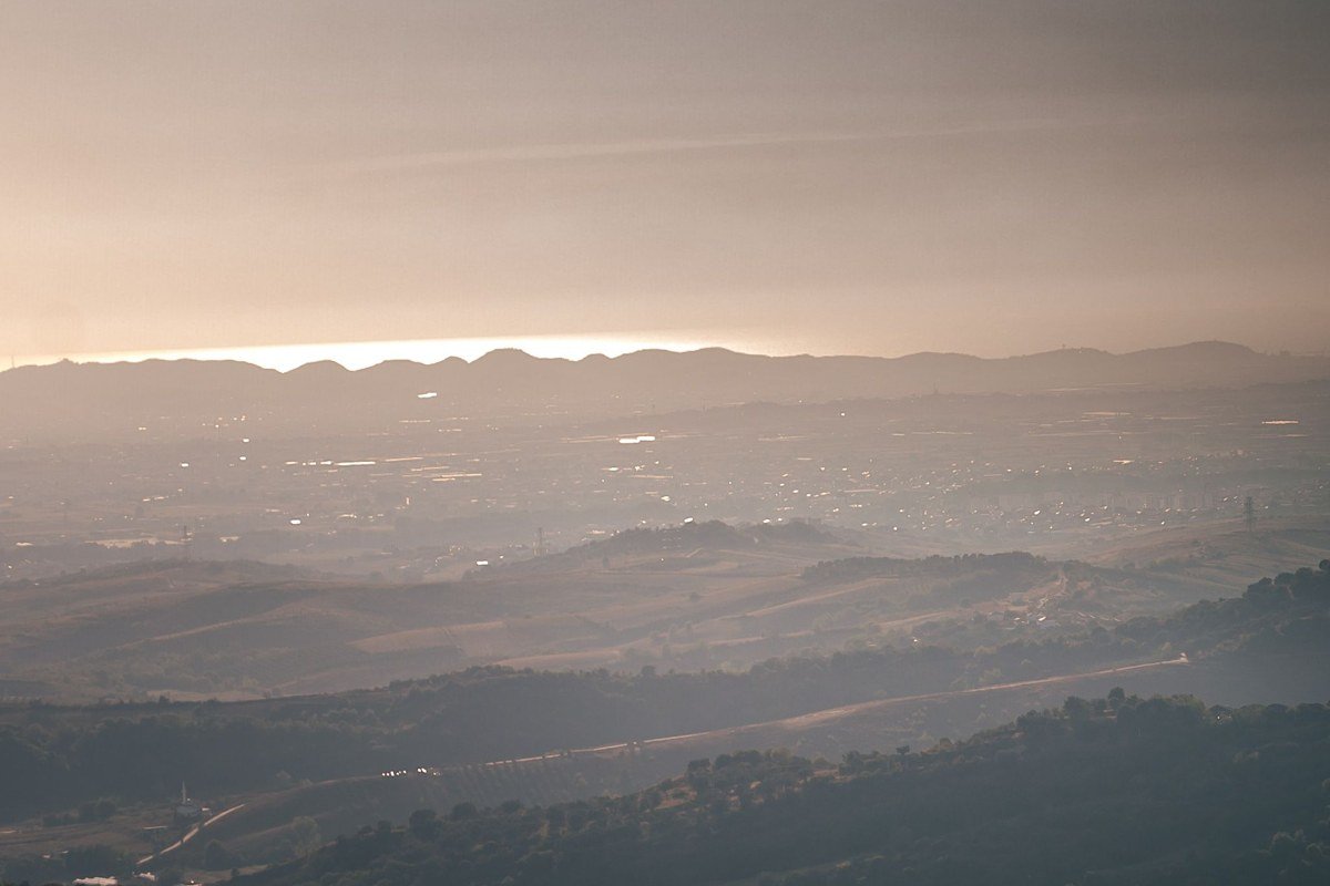 Foothills Parkway West overlook Tennessee winter sunrise with layered fog-filled valleys and bare ridgelines