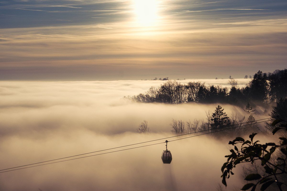 Gatlinburg SkyPark SkyBridge Tennessee sunrise view over foggy Smoky Mountain foothills