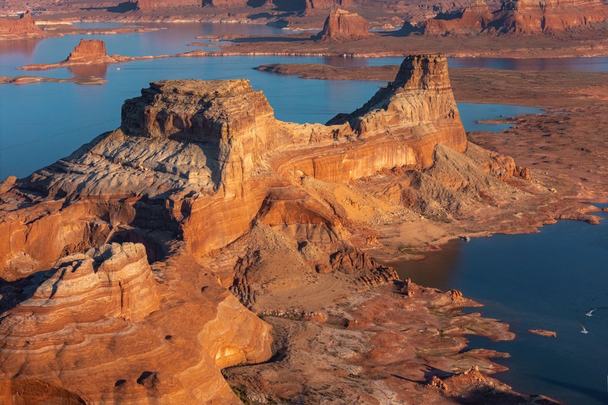 Green River Utah town with the river and desert bluffs at golden hour