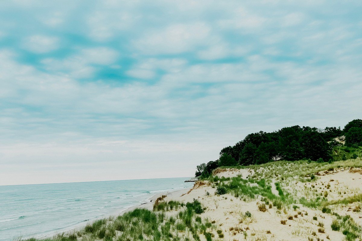 Sleeping Bear Dunes Michigan dune climb overlooking Lake Michigan at golden hour