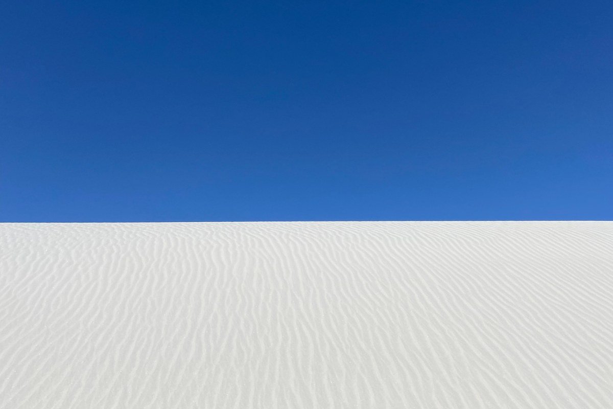 White Sands National Park New Mexico gypsum dunes at sunset with long shadows