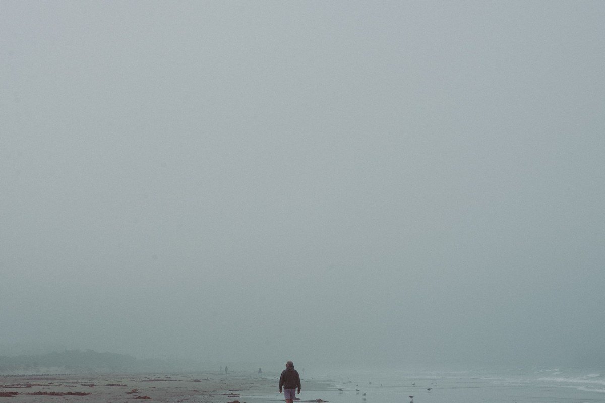 Reid State Park Maine sand dunes and beach with fog over the Atlantic
