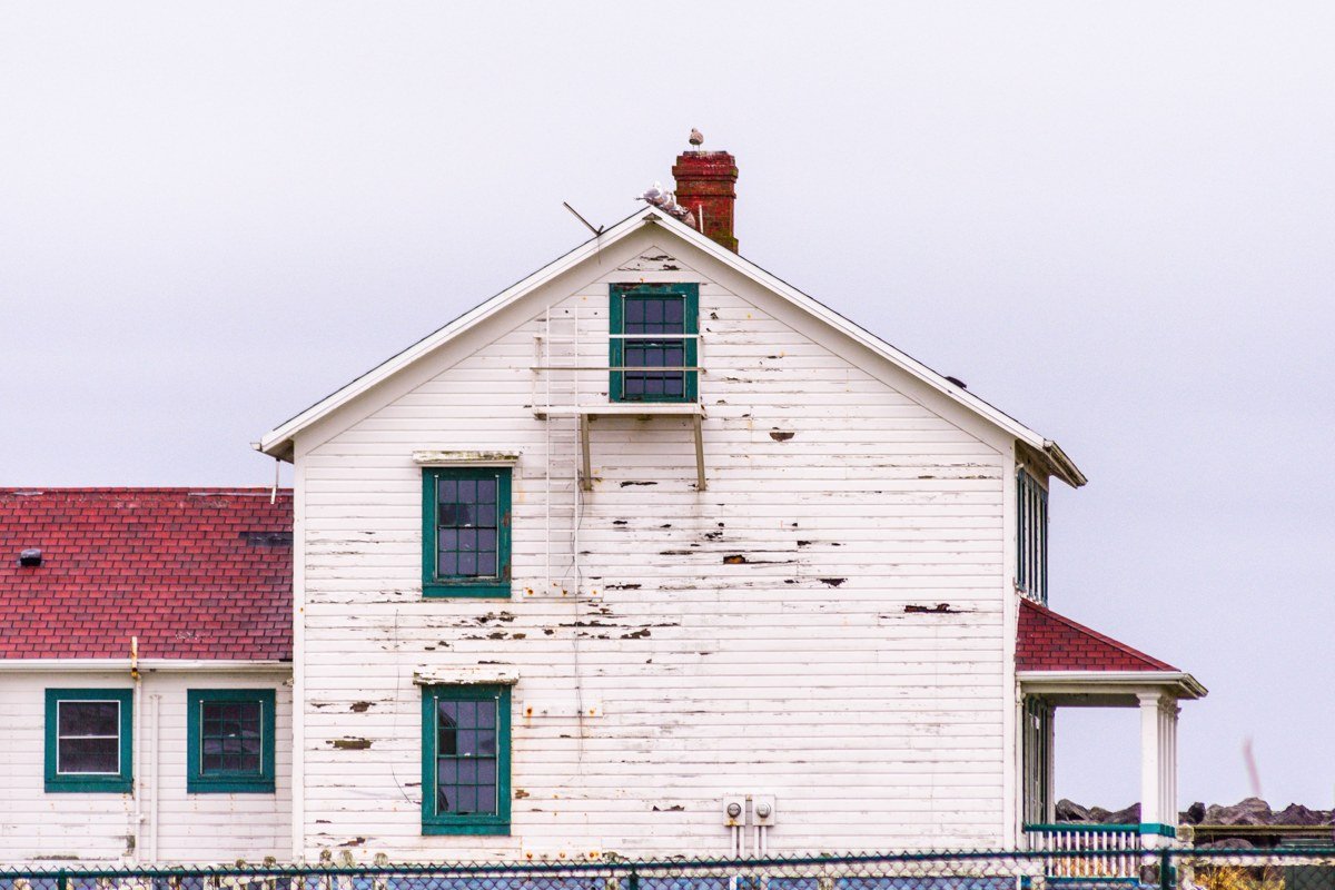 Raspberry Island lighthouse Wisconsin restored keeper's house white picket fence