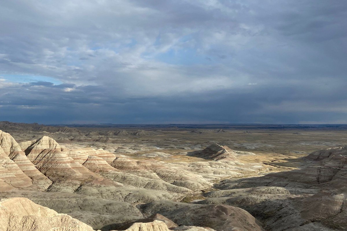 Door Trail Overlook Badlands fog drifting through eroded rock formations