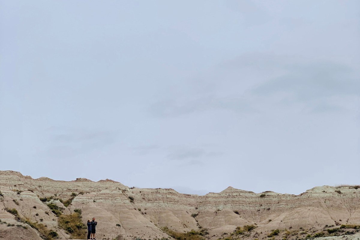 Panorama Point Badlands wide canyon view fog in valley below
