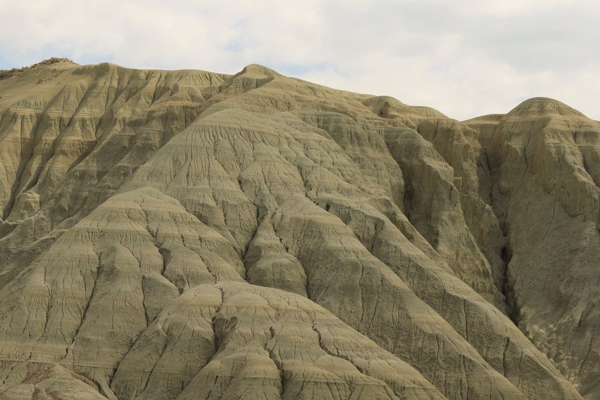 Yellow Mounds Overlook Badlands golden hills with fog lifting