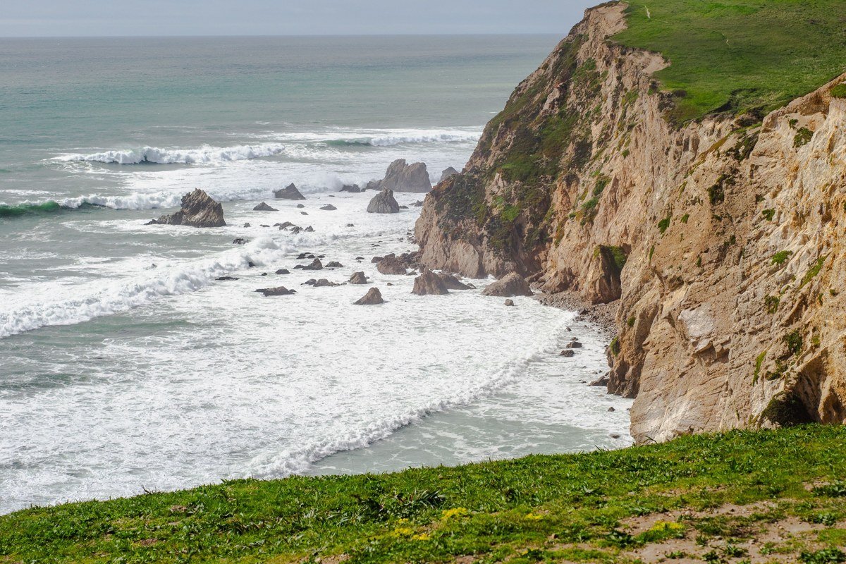Limekiln State Park rocky point with waves crashing below steep coastal cliffs, California