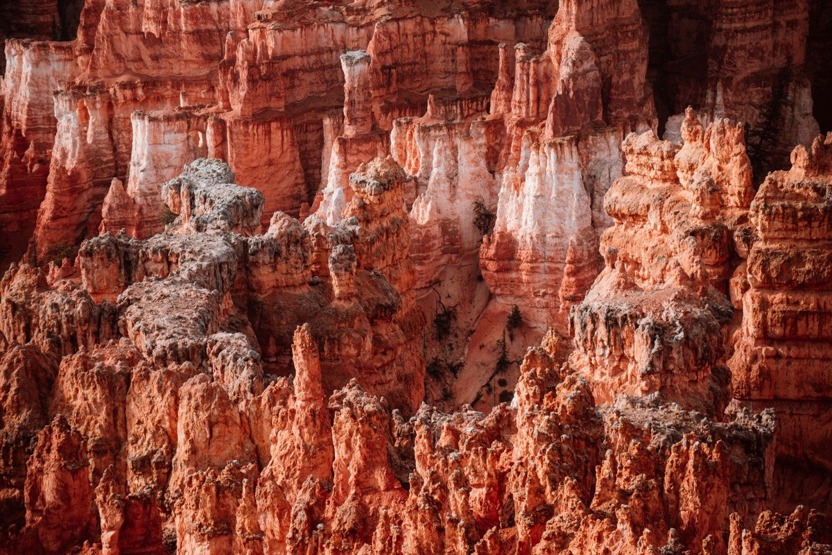 Orange Cliffs Overlook Canyonlands remote viewpoint with layered orange and tan rock formations stretching west