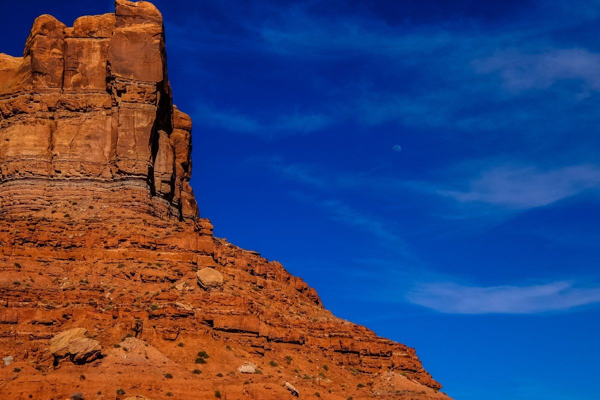 Aztec Butte Canyonlands sandstone dome with ancestral Puebloan granary ruins and wide canyon view