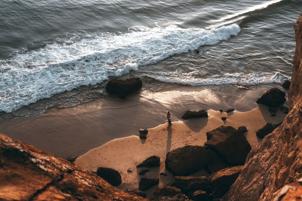 Cape Cod coastline aerial view dunes beach and ocean meeting at golden hour