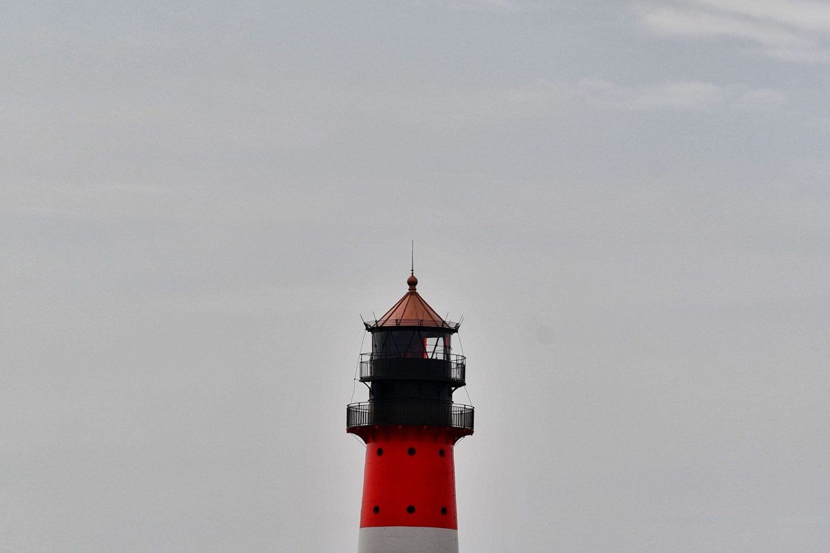 Nauset Light Beach Eastham Massachusetts red and white lighthouse above ocean bluff