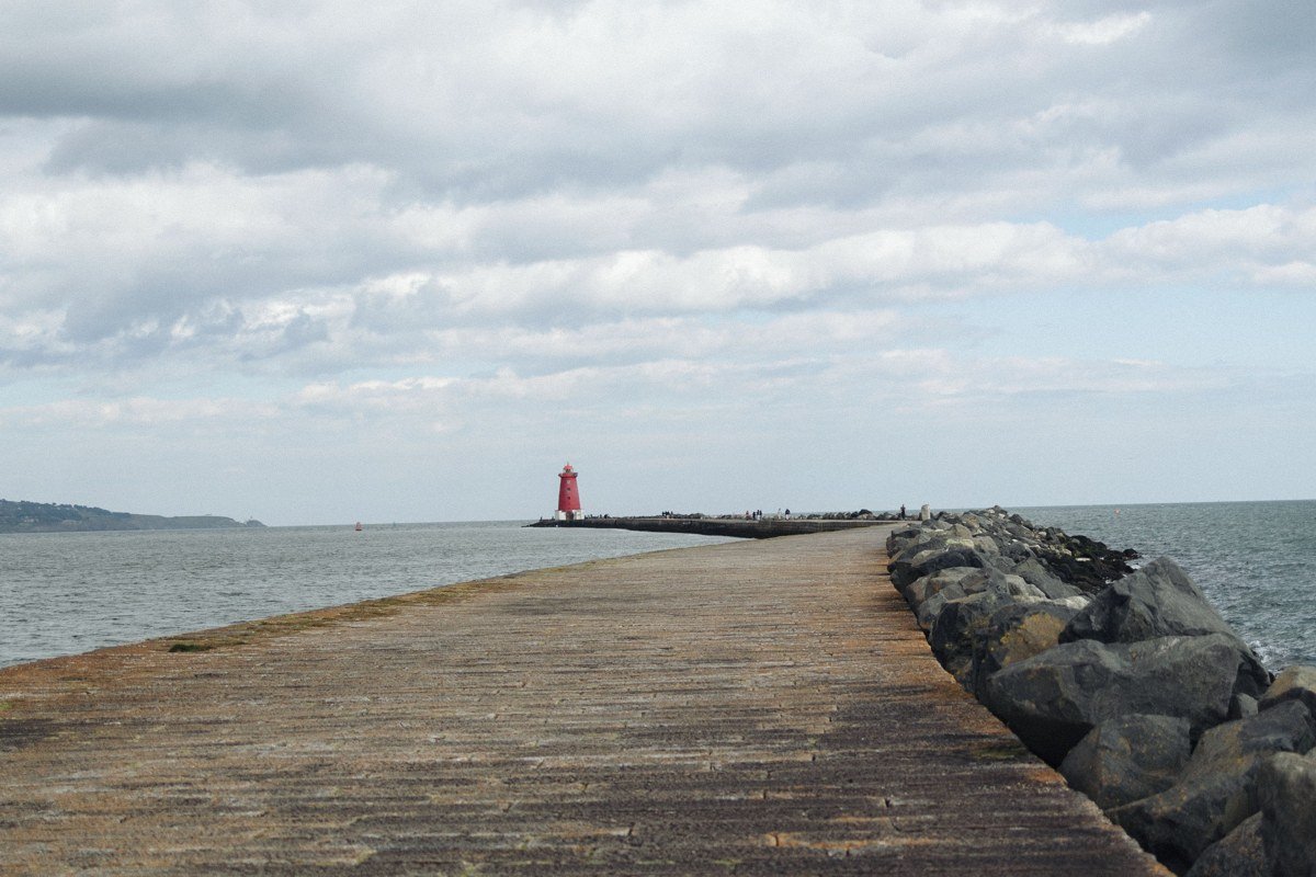 Rockland Maine breakwater lighthouse disappearing into evening fog