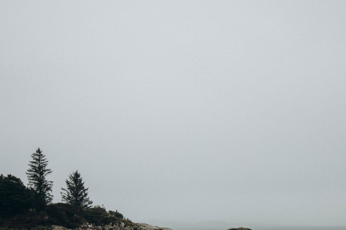 Bar Harbor Maine fog over Frenchman Bay with Cadillac Mountain behind