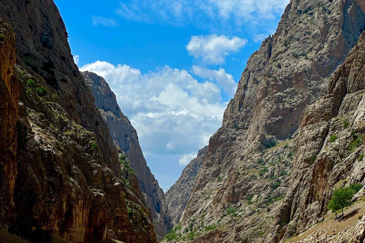 Clear Creek Colorado whitewater rafting raft bouncing through rocky narrow canyon near Idaho Springs