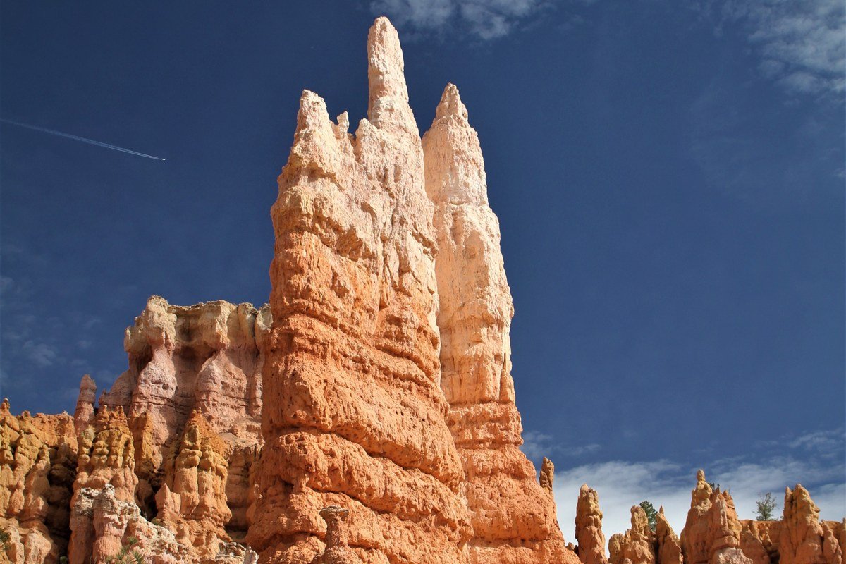 Bryce Canyon Sunset Point hoodoos glowing orange and pink at golden hour