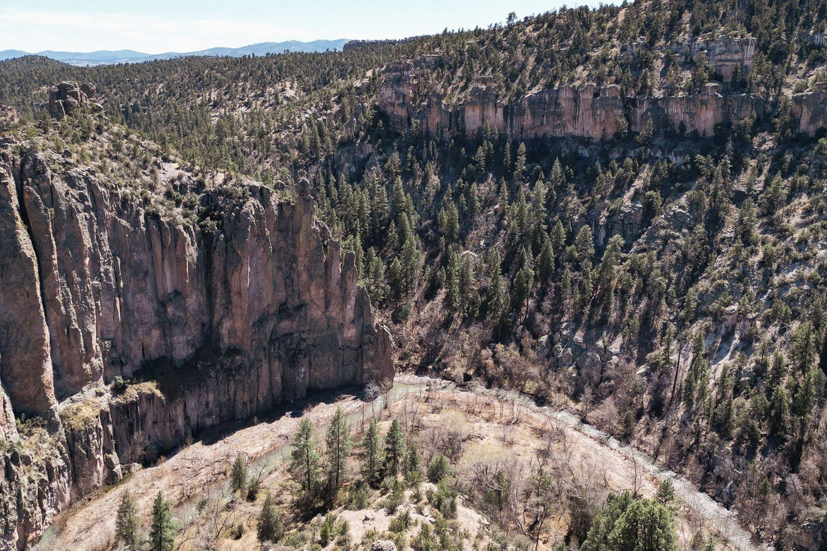 Boulder Mountain overlook Utah aspen forest and distant red rock canyons from high elevation
